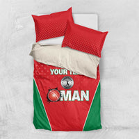 Red and green cricket-themed bedding set with duvet and two pillows on white background.