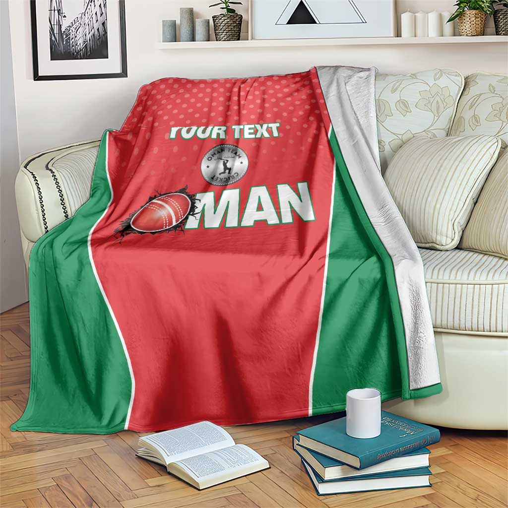 Red sports blanket with green border, white dots, printed "YOUR TEXT" and cricket ball