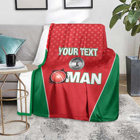 Red sports blanket with green border, white dotted pattern, "YOUR TEXT" and cricket ball graphic