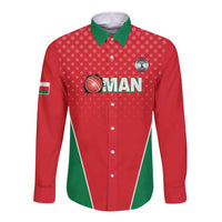 Red Oman long-sleeve button shirt with green collar and diagonal panel