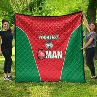 Custom cricket quilt outdoors, red-and-green panels with 'YOUR TEXT' and 'OMAN'.