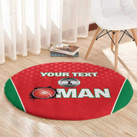 Red round cricket rug with green border, 'YOUR TEXT' area and 'MAN' design