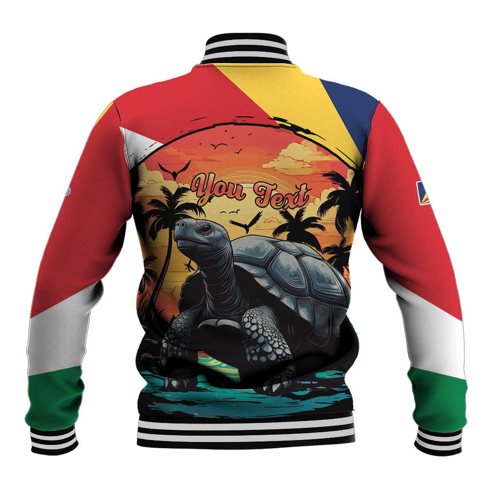 Colorful baseball jacket back view with ribbed hem and large tortoise artwork.