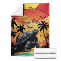 Folded tropical giant tortoise blanket with palms, sunset scene, and 'Your Text' title