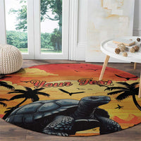 Round beach carpet with giant tortoise, palm silhouettes, and 'Your Text' sunset design.