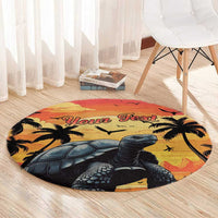 Round beach carpet with giant tortoise, palms and 'Your Text' banner in sunset tones.