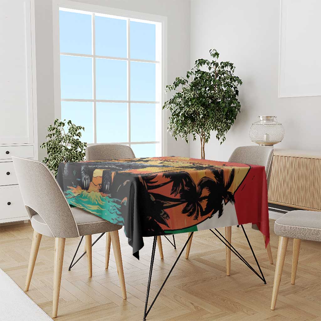 Personalized tablecloth on dining table with tropical tortoise, palms, and sunset colors