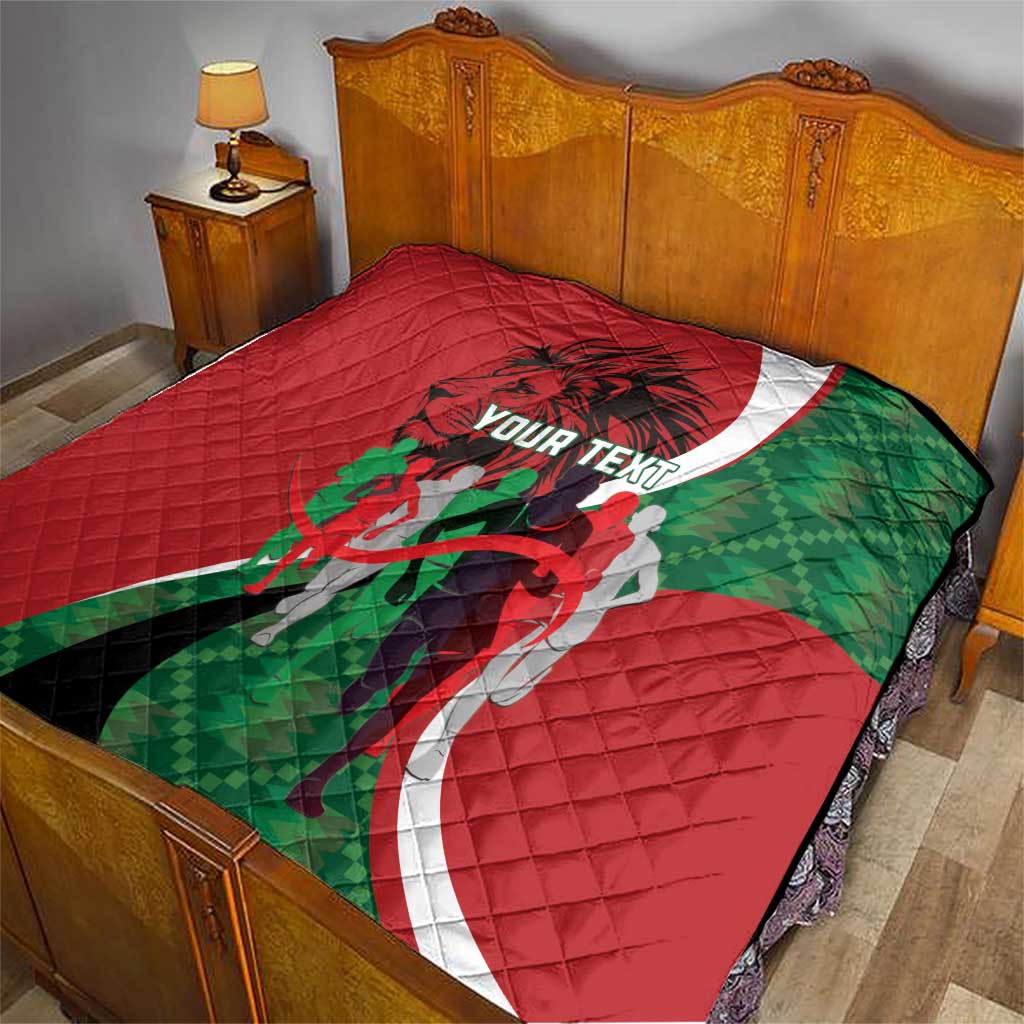 Red personalized athletics quilt with quilted stitching, green-and-white stripe design on bed