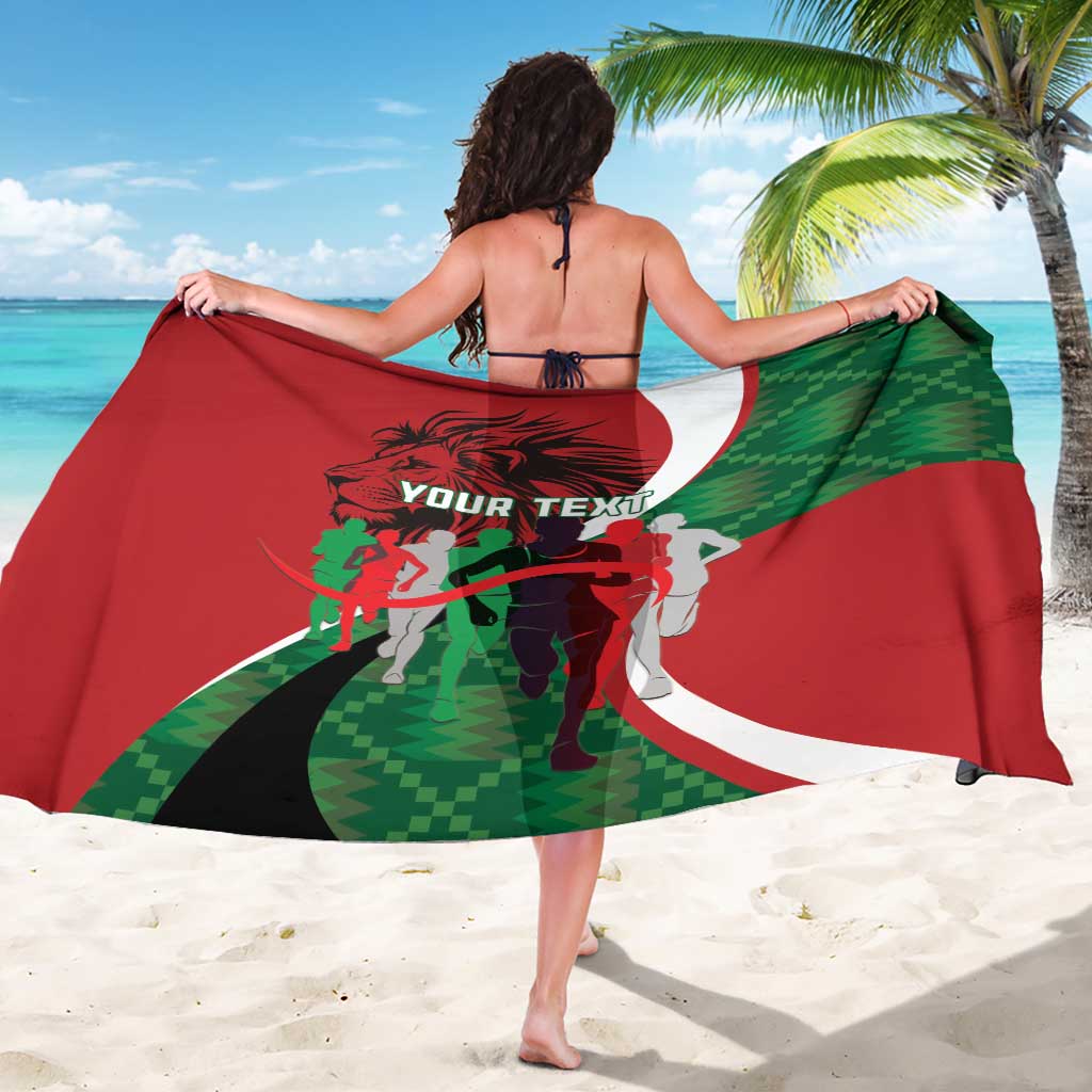 Red and green athletic sarong draped wide with custom text and runner silhouettes