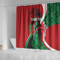 Red shower curtain panel with lion head, athlete silhouettes, and green geometric strip