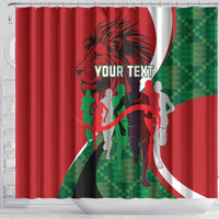 Red shower curtain with central lion head, “YOUR TEXT” label, and green athlete figures