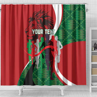 Red shower curtain with lion graphic, “YOUR TEXT” text, and green-and-red geometric pattern