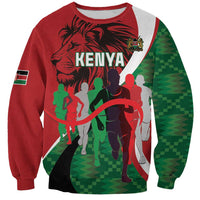 Red crewneck sweatshirt with Kenya graphic front and green patterned side sleeves