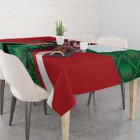 Red, green and white athletics tablecloth with diagonal striped edge over table