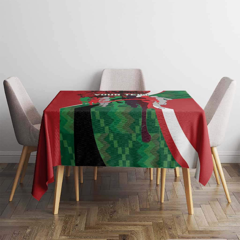 Red, green and white athletics tablecloth on small round table with four chairs