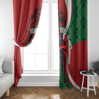 Red window curtain pair with green pixel sections and black athlete lion design