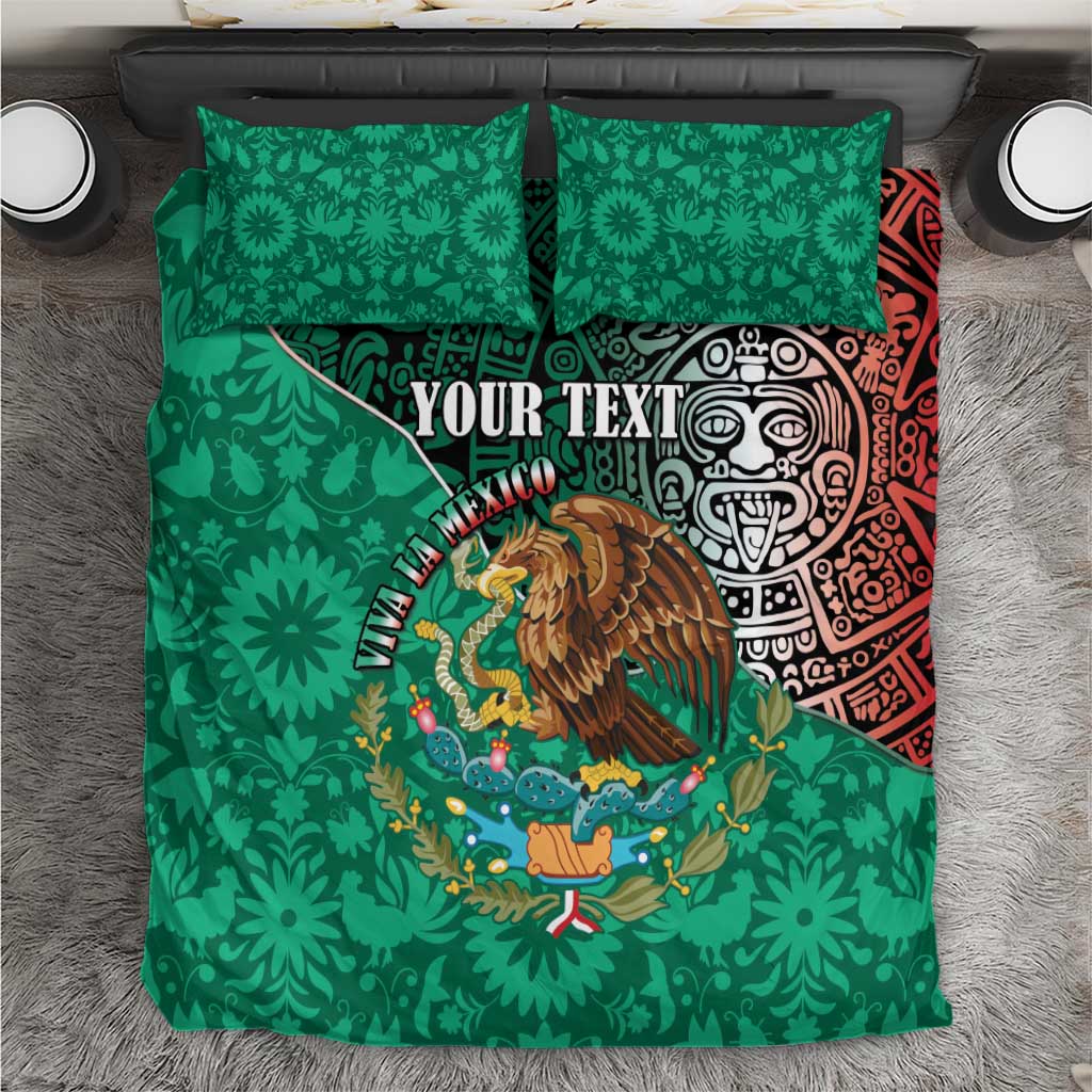 Green bedding set top view with two pillowcases, eagle crest, and Aztec geometric face