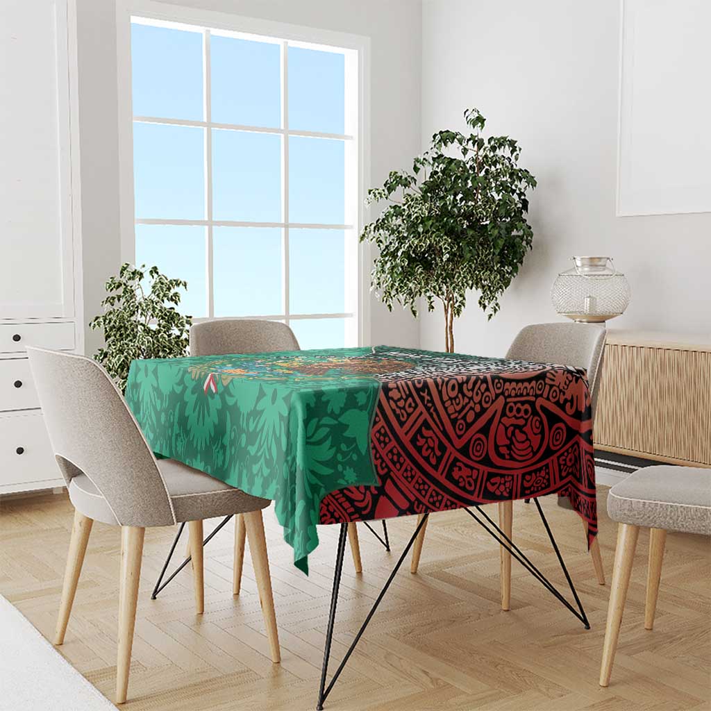 Green tablecloth with leaf pattern and red Aztec-style panel across dining table