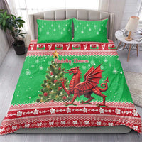 Green Christmas bedding set with dragon artwork, snowflakes and red border; two pillowcases