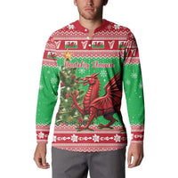 Dragon Christmas button sweatshirt with green front panel and patterned red trim
