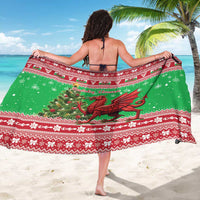 Green and red Christmas sarong with large Welsh dragon graphic and border print