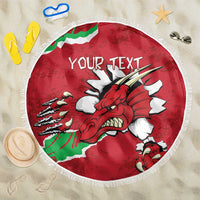Round red beach blanket with Welsh dragon graphic, white fringe, and “YOUR TEXT” center.