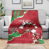 Personalised Wales blanket draped on sofa: red Welsh dragon with green-white stripes, Your Text