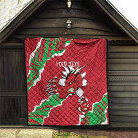 Red Wales quilt hanging indoors with Welsh dragon graphic and custom text in center