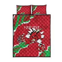 Red quilt bed set with dragon print, green/white border, and two matching pillowcases