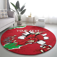 Round red rug with Welsh dragon head and “YOUR TEXT” on top, green white border