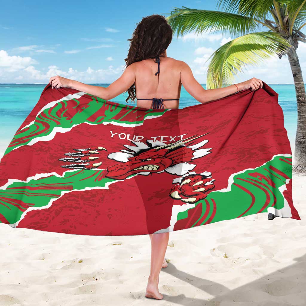 Red Wales sarong shown from back with Welsh dragon graphic and personalized text