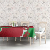 Red personalized Wales tablecloth with green dragon design over long dining table