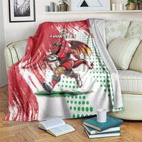 Red, white and green Wales rugby mascot blanket with dragon graphic and split back design