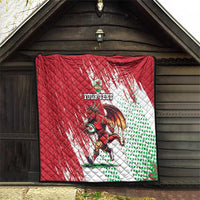 Red quilt with white and green polka dots, Wales dragon mascot artwork and “Your text”