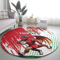 Red round rug with dragon mascot, rainbow tail, green dots, and “YOUR TEXT”