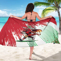 Red and white sarong with dragon mascot graphic and custom text, worn wrap