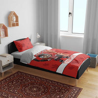 Red and white hockey duvet featuring 2025 mascot holding trophy and Champions band; two pillowcases