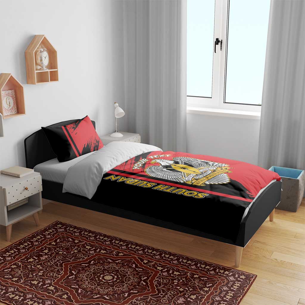 Red and black duvet with South Sudan crest and eagle artwork, matching pillows
