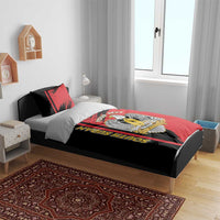 Red and black duvet with South Sudan crest and eagle artwork, matching pillows