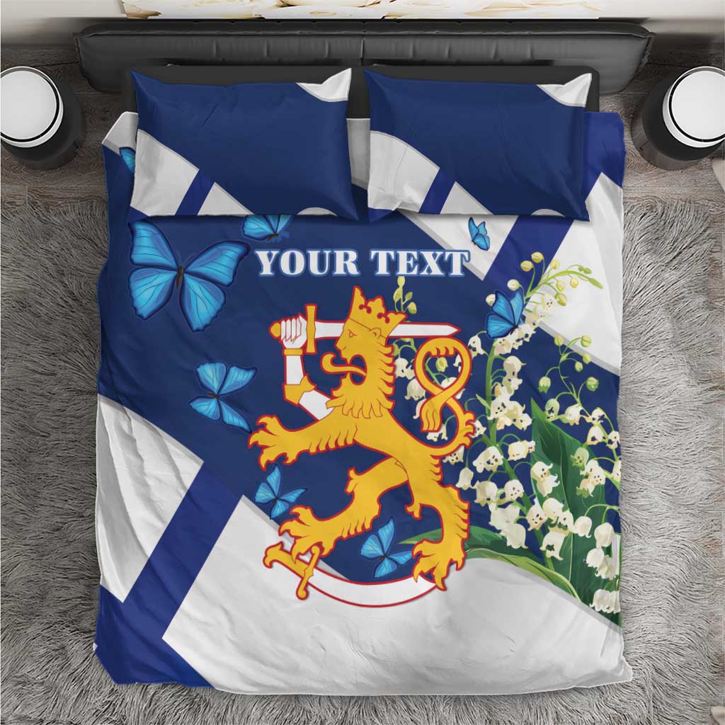 Blue and white bedding set with crest, butterflies, and “YOUR TEXT” on duvet and pillowcases