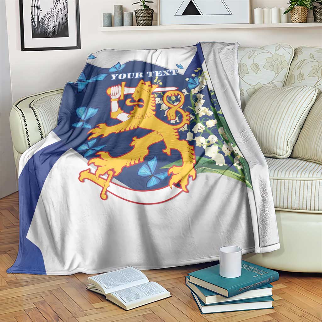 Personalized blue and white blanket with coat-of-arms crest and centered “YOUR TEXT”.