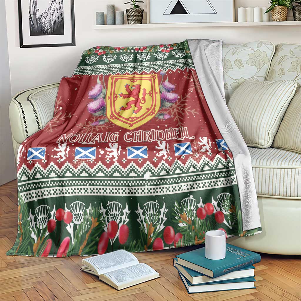 Red Christmas blanket with Scottish shield crest, tulips, and festive border pattern