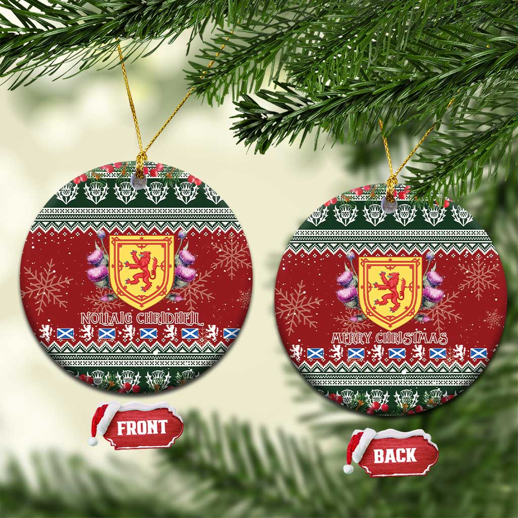 Red round ceramic Scotland ornament with royal lion crest and Scottish holiday pattern, hanging