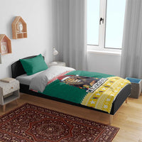 Green lion-Santa duvet with CAMEROON text and yellow border, two matching green pillowcases