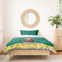 Green bedding set with lion-Santa design, CAMEROON lettering, and yellow patterned edge
