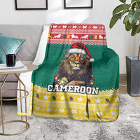 Green Christmas blanket with lion in Santa hat and 'CAMEROON' across the center