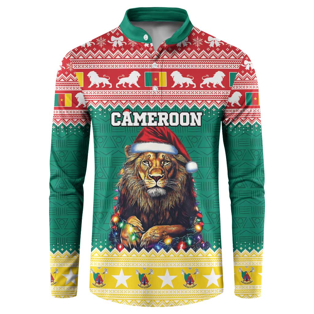Green button sweatshirt with red knit yoke; lion in Santa hat and 'CAMEROON' print