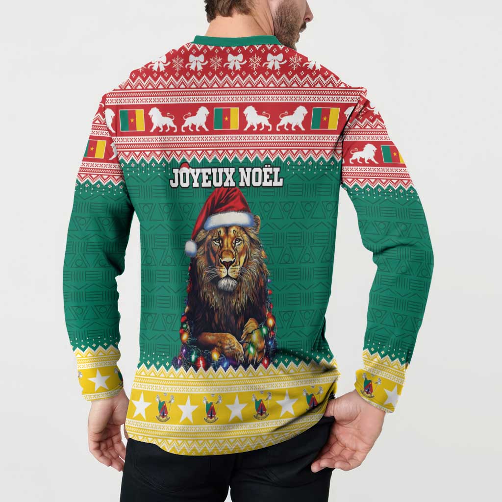 Green holiday button sweatshirt back view; 'JOYEUX NOEL' text with lion under lights