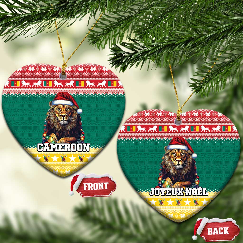 Green ceramic heart-shaped Christmas ornament with lion in Santa hat and gold hanging loop.
