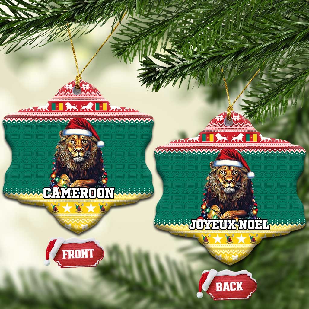 Green ceramic heart-shaped Christmas ornament showing lion in Santa hat and gold hanging loop.
